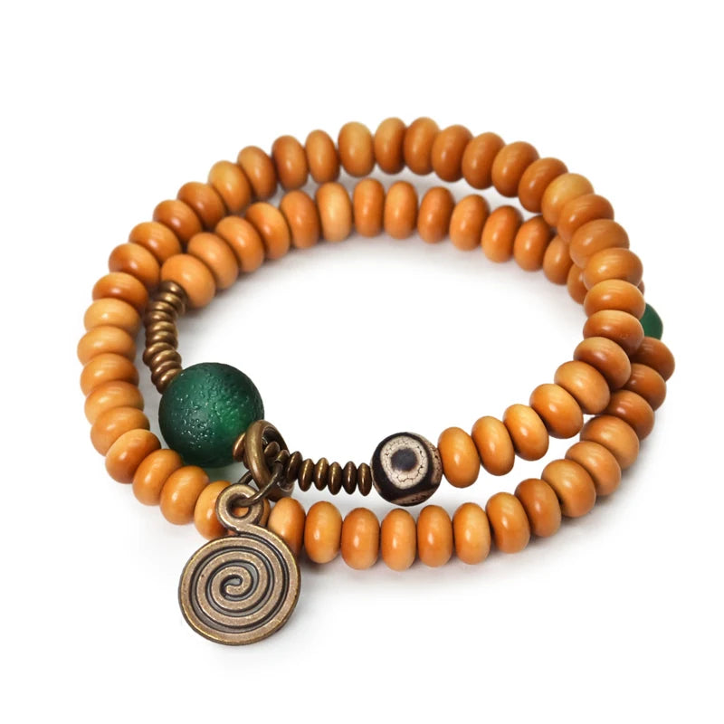 🌿 Bracelet double rang en noyau d’olive & grande perle en onyx vert – Perle Œil de Bouddha tibétain DZI – Bijou unisexe protecteur 🌿