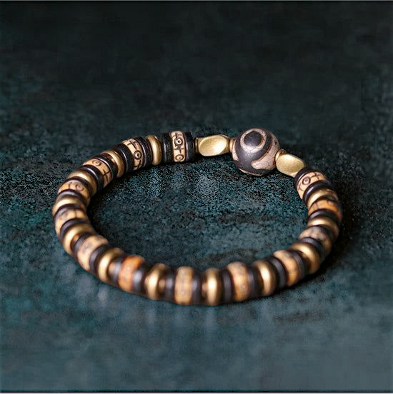 🤍 Bracelet en os de yak sculpté & bois d’ébène – Perle DZI tibétaine Œil protection et abondance – Bijou artisanal spirituel unisexe 🤍